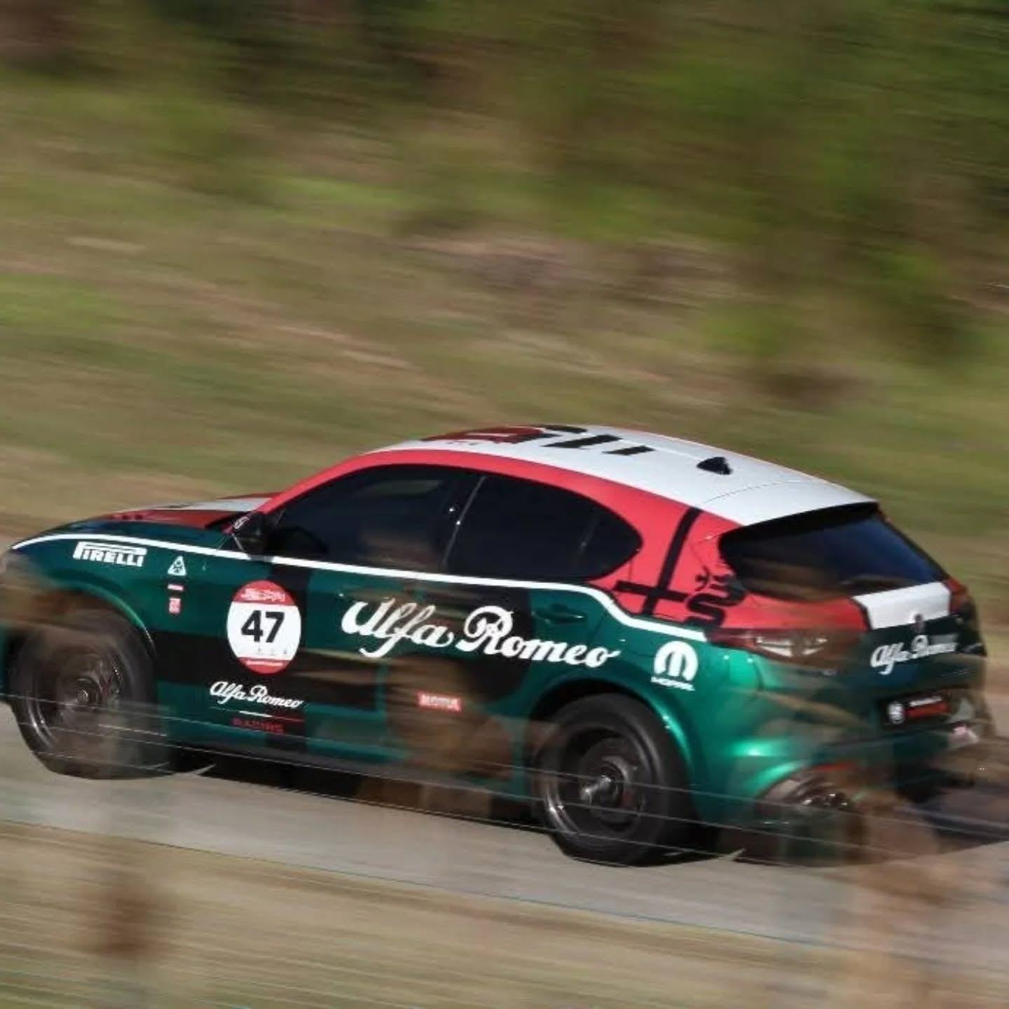 Tested at Speed: Xignature’s EZ-Release Plate Holder Runs Simola on Alfa Stelvio QV